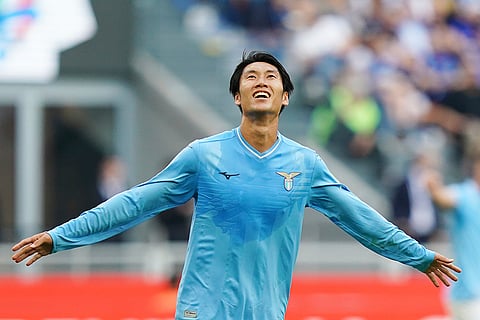 Daichi Kamada celebrates scoring a goal